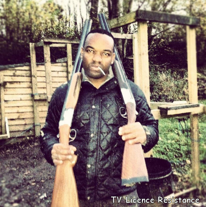 Rory Reid posted the shocking picture of him holding two guns on Facebook in 2012